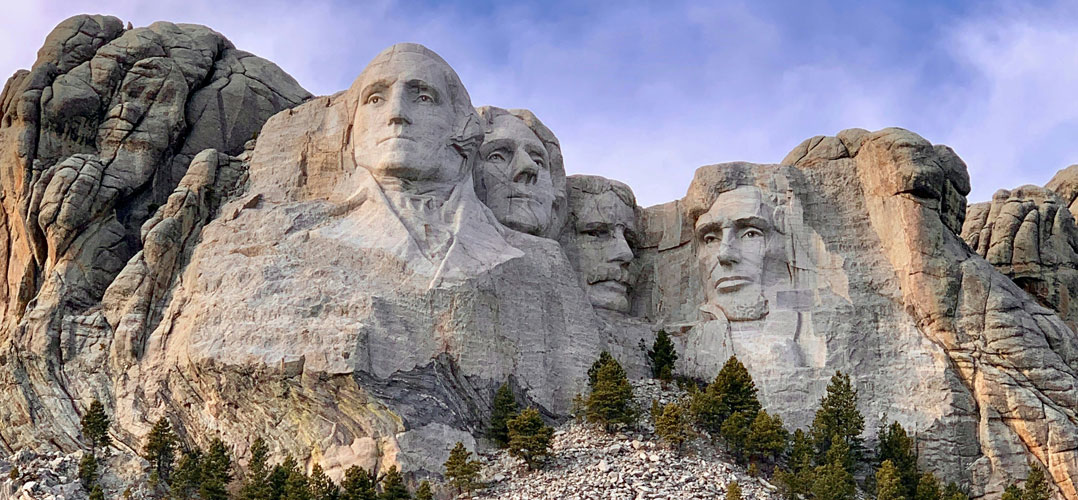 Mount Rushmore granite carving of U.S. presidents George Washington, Thomas Jefferson, Theodore Roosevelt and Abraham Lincoln.