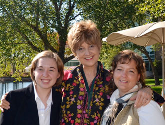 Two award winning students posing with Natalie Hahn