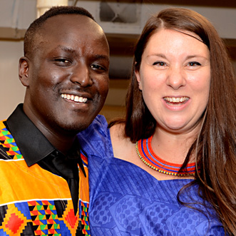 African man and woman standing side by side