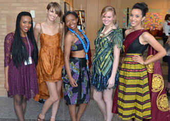 Five college student modeling their fashion creations