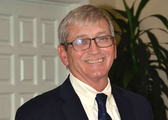 Professional man in suit smiling