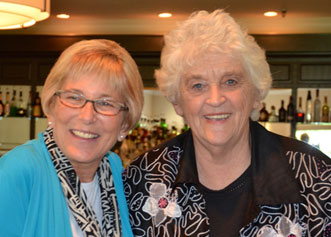 Two senior women smiling